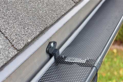 How do you protect gutters when replacing roof?