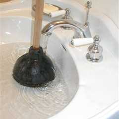 Unclog a Slow Draining Bathroom Sink Using a Plunger