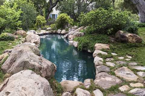 How do you clean landscaping boulders?