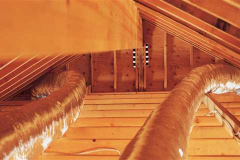 What temp should attic fan be set at in winter?
