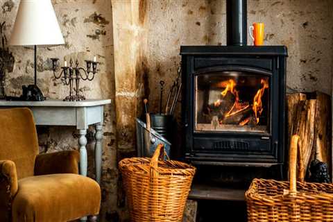 Which heats better wood stove or fireplace?