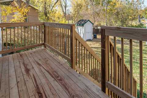 Ensuring A Seamless Transition: Working With A Kalamazoo Roofer Post-Deck Construction