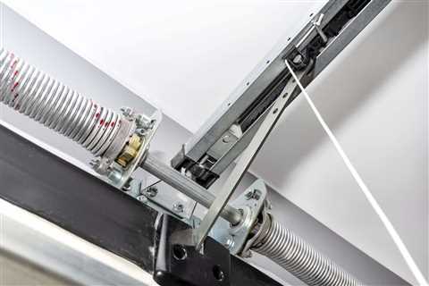Signs It’s Time to Replace Your Garage Door Springs - Stapley Action Garage Door